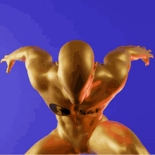 a gold statue with a s4f logo on his chest