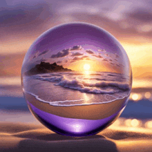 a purple glass ball with a sunset on the beach inside of it