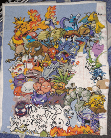 a cross stitch of pokemon characters with the number 29 on it