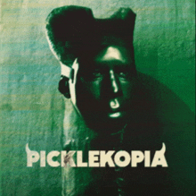 a picture of a man with horns and the word picklekopia