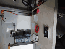 a kitchen table with a bowl of food and a pair of glasses on it