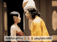 a man and a woman are looking at each other with a caption that says ambillah semua