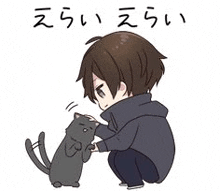 a boy is kneeling down and petting a cat .