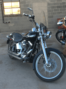 a harley davidson motorcycle is parked in a parking lot