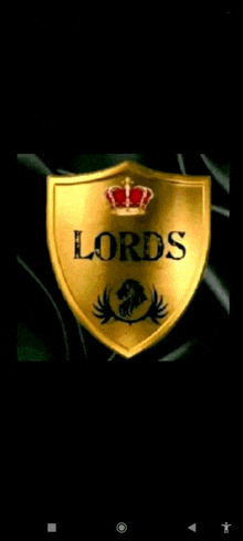 a gold shield with a crown and the words lords on it