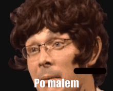 a close up of a man with glasses and the words po malem on his face