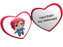 a heart shaped mirror says nacchan my beloved on it