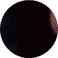 a black circle on a white background that looks like a moon