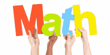 a group of children holding up the word math