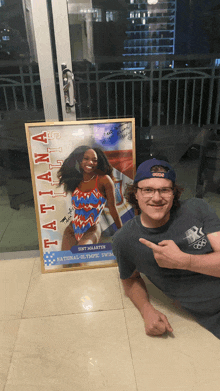 a poster of tatiana sits on a tiled floor