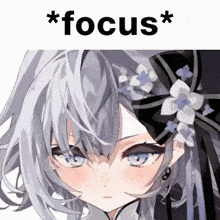 a picture of a girl with a flower in her hair and the words * focus * below it