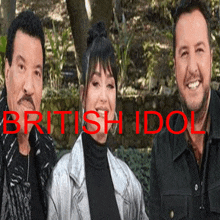 a group of people standing next to each other with the word british idol in red letters