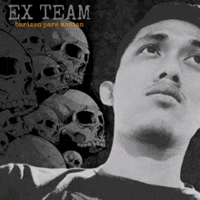 a black and white photo of a man surrounded by skulls with the words ex team written above him