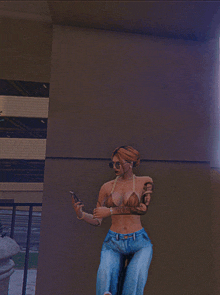 a woman wearing a bikini top and jeans is standing in front of a wall