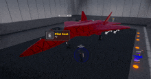 a red fighter jet with a pilot seat displayed on the screen