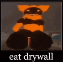 a picture of a cartoon cat with the words `` eat drywall '' written on it .