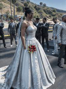 a woman in a wedding dress holds a bouquet of flowers