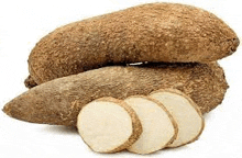 two yams are stacked on top of each other on a white background and sliced in half .