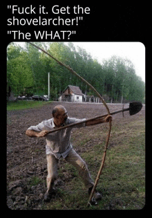 a man is holding a shovel with a bow and arrow in a field