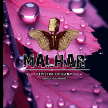 a logo for malhar rhythm of rain with a microphone and wings