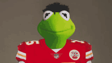 kermit the frog is wearing a chiefs jersey with the number 5 on it