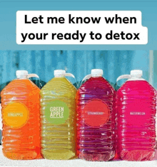 four gallon bottles of different flavors of juice with the words let me know when your ready to detox below them