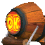 a wooden barrel with a donkey kong logo on it is sitting on a table .