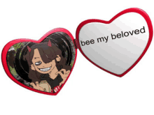 a heart shaped mirror says bee my beloved on it