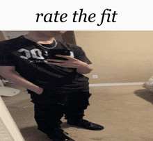 a man taking a picture of himself in a mirror with the words rate the fit above him