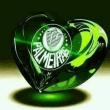 a green heart with a palmeiras logo on it .