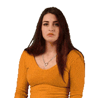 a woman wearing a yellow sweater and a necklace