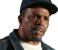 a man wearing a hat and a denim jacket is looking at the camera