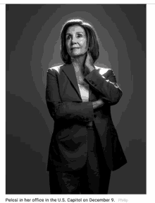 a picture of pelosi in her office in the u.s. capitol on december 9