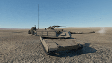 a tank with smoke coming out of it 's barrel in the desert