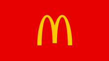 a red background with a yellow mcdonalds logo