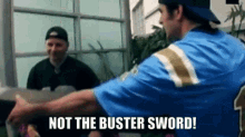 a man in a blue shirt with the words not the buster sword