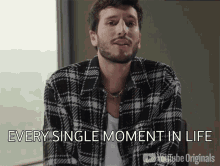 a man in a plaid shirt says every single moment in life on youtube originals