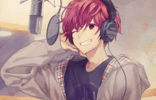 a boy with red hair is wearing a pair of headphones that say sony