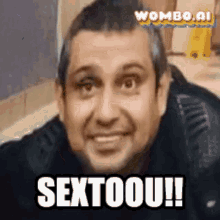 a close up of a man 's face with the words sextoou on it .