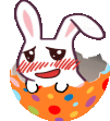 a cartoon bunny is sitting in a colorful egg .