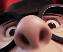 a close up of a cartoon character 's nose with a mustache .