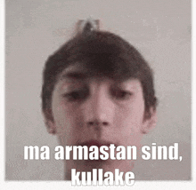 a picture of a young man with the words ma armastan sind kullake on the bottom