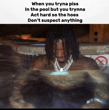 a man with dreadlocks is in a pool with a caption that says when you tryna piss in the pool but you trynna act hard