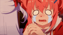 a girl with red hair is crying with a tear running down her cheek