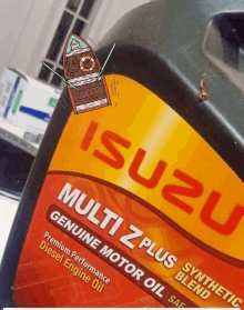 a close up of a bottle of isuzu multi z plus genuine motor oil