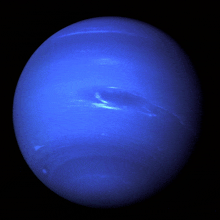 a blue planet with a black background and a few white spots on it