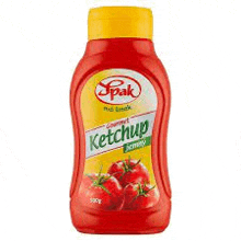 it is a bottle of ketchup with tomatoes on it .