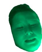 a person 's face is glowing green and their eyes are closed