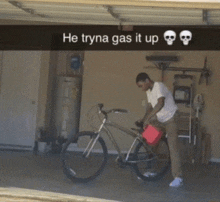 a man is pumping gas into a bike in a garage