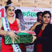 a woman in a red dress with a sash that says fym-bb-m on it